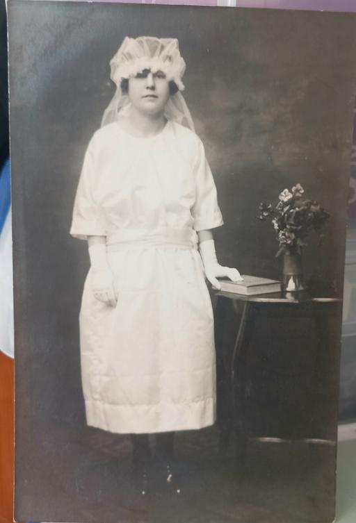 Buy & Sell Merseyside Saint Helens - Photos for 1920s lady by table real photograph postcard