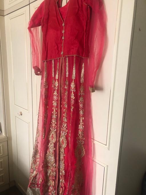 Buy & Sell - Photos for Pink net churidar suit