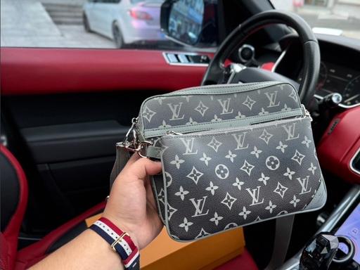 Buy & Sell Leatherhead Mole Valley - Photos for Louis Vuitton Pouch black and grey +Box