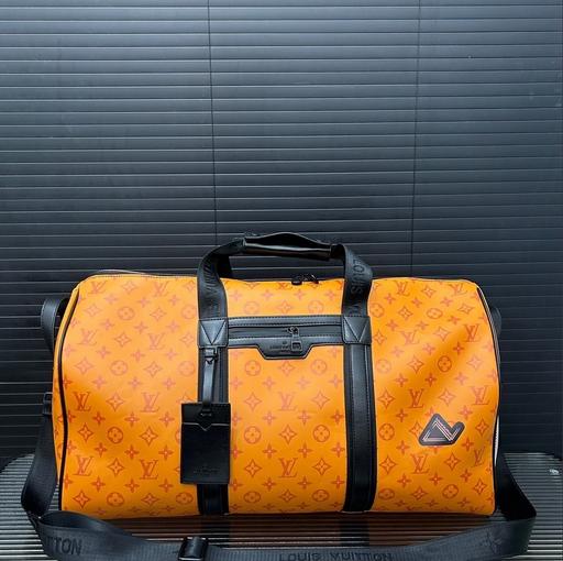Buy & Sell Leatherhead Mole Valley - Photos for Orange Louis Vuitton Duffel bag