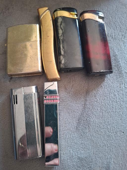 Buy & Sell Plaistow East London - Photos for collection lighter silver on left I know his