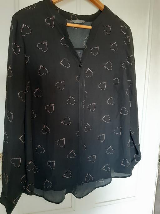 Buy & Sell Edmonton North London - Photos for Ladies black blouse with a heart pattern.
