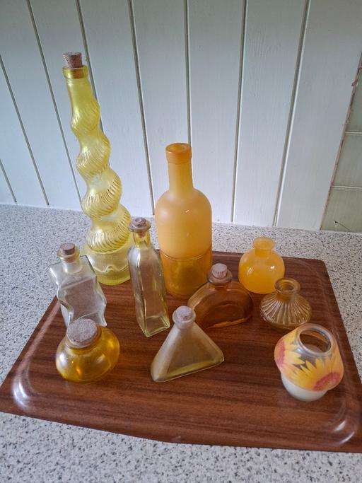 Buy & Sell Banstead Reigate and Banstead - Photos for Collection of yellow glass bottles.