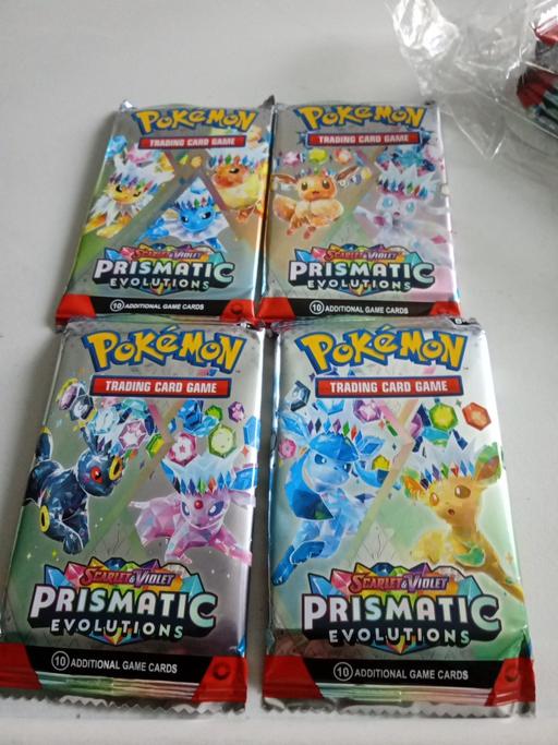 Classes Horncastle East Lindsey - Photos for 4 packs of Pokémon trading cards sets