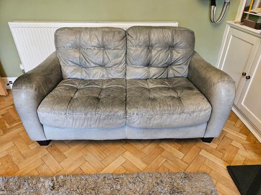 Buy & Sell Windle Saint Helens - Photos for Leather couch with foot stool.
