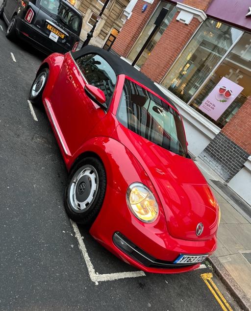 Vehicles Barbican Central London - Photos for Red beetle vw