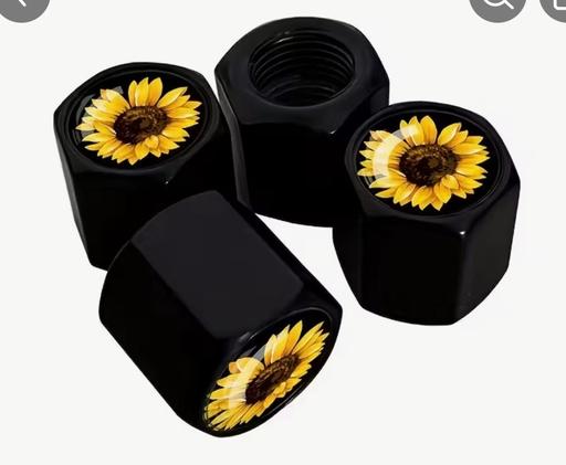 Vehicles St Giles Lincoln - Photos for Sunflower metal tyre caps