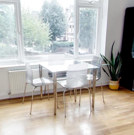 Buy & Sell Hampton Richmond upon Thames - Photos for Four seater glass and silver dining table