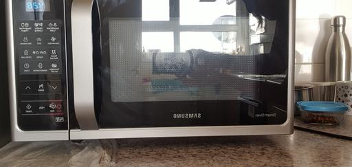 Buy & Sell Stratford East London - Photos for Samsung Combination Microwave - Silver