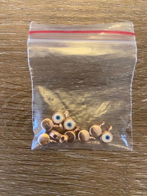 Buy & Sell Wandsworth South West London - Photos for 9x small rose gold evil eye jewellery charms