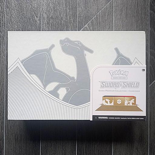 Buy & Sell Walworth South East London - Photos for Pokemon Charizard UPC SWSH Evolving Skies NEW