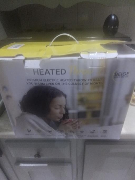 Buy & Sell Aldridge Walsall - Photos for New MONHOUSE HEATED THROW COLOUR BEIGE