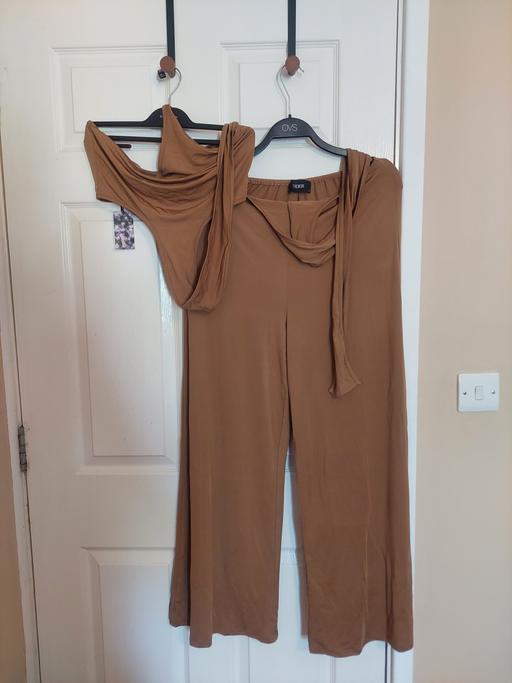 Buy & Sell Stepney East London - Photos for Cut Out Waist Tie Jumpsuit