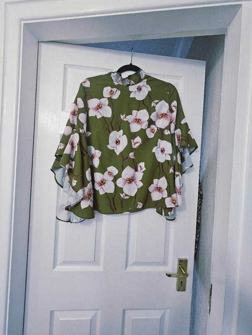 Buy & Sell Newton Doncaster - Photos for Pretty floral top, size 14..