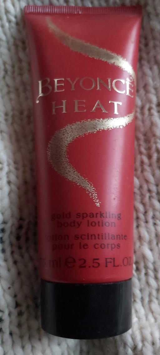 Buy & Sell Asfordby Hill Melton - Photos for Beyoncé HEAT gold sparkling body lotion