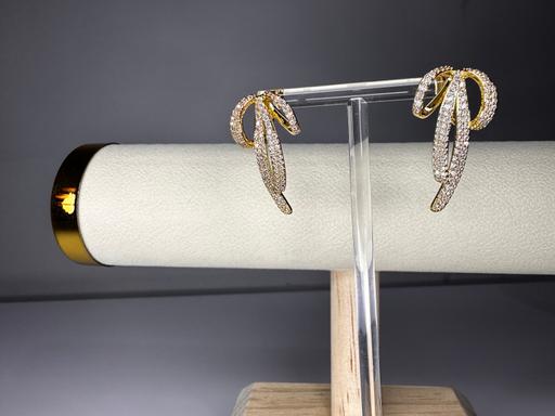 Buy & Sell Tuebrook Liverpool - Photos for Diamond stoned ribbon fashion earrings.