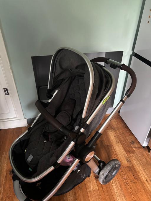 Buy & Sell Knottingley Wakefield - Photos for Dark grey pram with brown handle