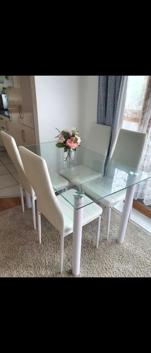 Buy & Sell Leyton East London - Photos for Glass dining table and 4 faux leather chairs