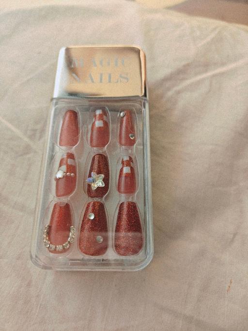 Buy & Sell St Johns South East London - Photos for Glitter Red Brown Cat Eyes False Nail