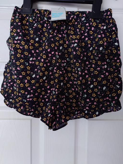 Buy & Sell Woodthorpe Charnwood - Photos for Girls black floral shorts size 9-10 years
