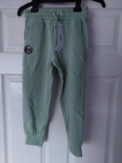 Buy & Sell Woodthorpe Charnwood - Photos for Girls green joggers size 5-6 years