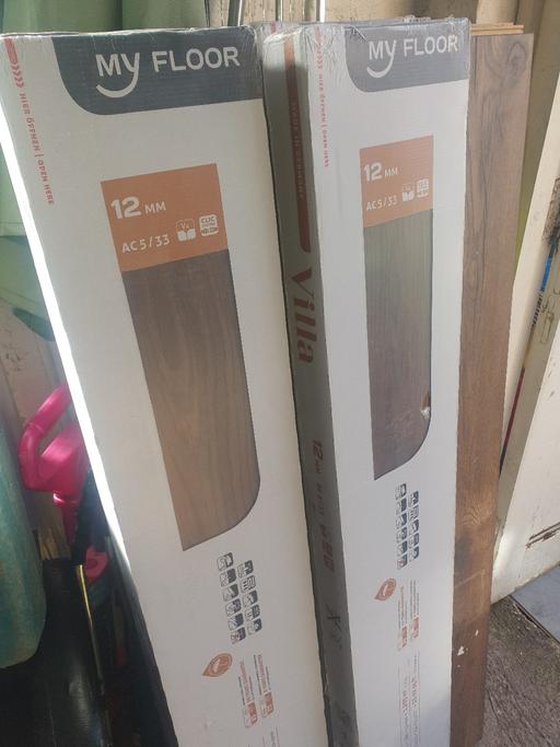 Buy & Sell Pensnett Dudley - Photos for BNIP 12mm Flooring , 4 Packs Of 5 Pieces .