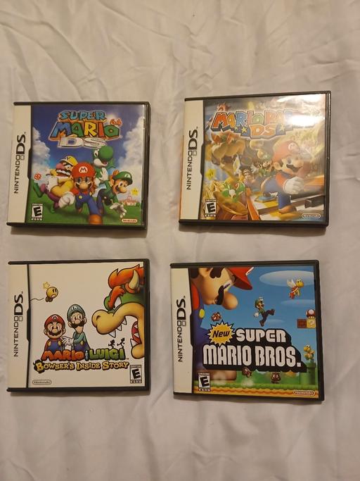 Buy & Sell Netherton Dudley - Photos for super Mario games x4 for Nintendo Ds