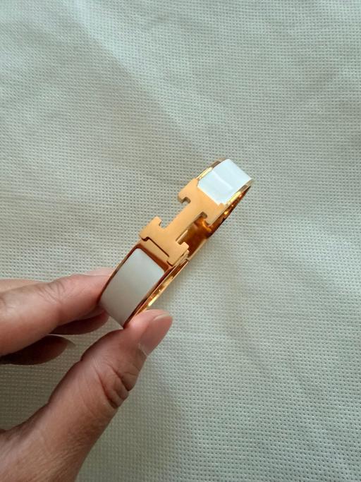 Buy & Sell Bowes Park North London - Photos for Gold plated stainless steel H bangle white