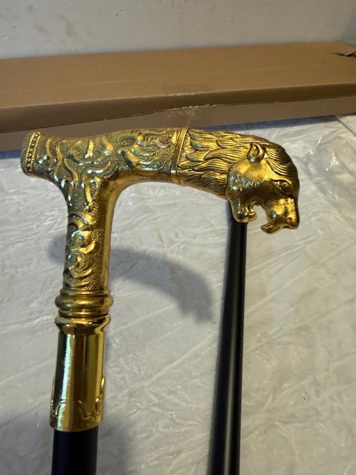  — Lions head walking stick cane