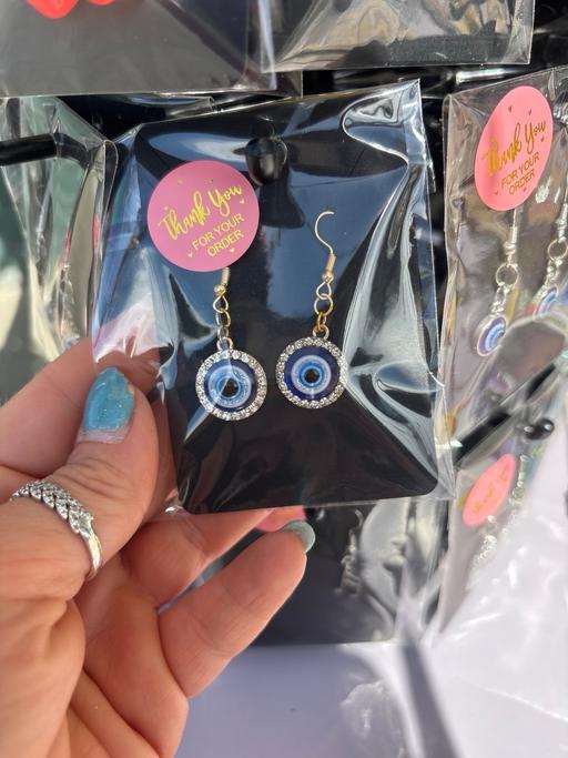 Buy & Sell Laindon Basildon - Photos for Rhinestone goldtone dangle evil eye earrings