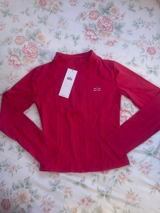 Buy & Sell Barbican Central London - Photos for Alo gym jacket hot pink size m