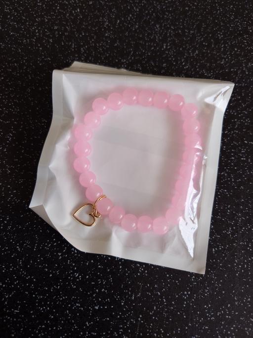 Buy & Sell Woodthorpe Charnwood - Photos for Women's pink bead bracelet with heart charm