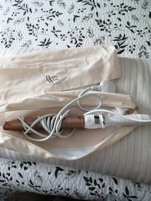  — Beauty works curling brush