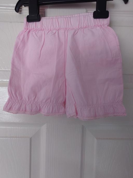  — Baby girls pink shorts size 9-12 months