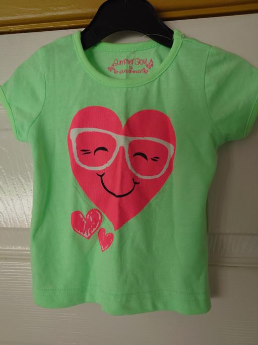  — Baby girls green top size 9-12 months