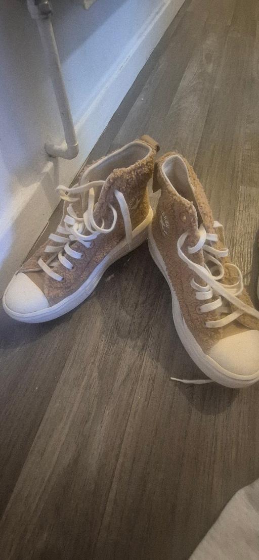  — woman's converse