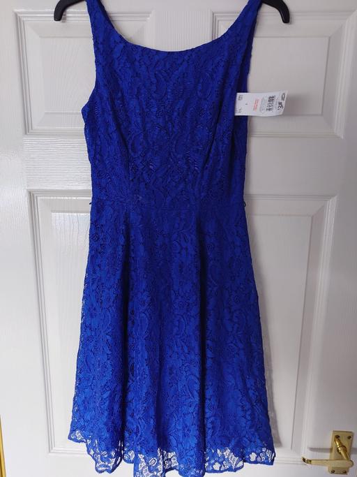  — Women's blue lace dress size 6