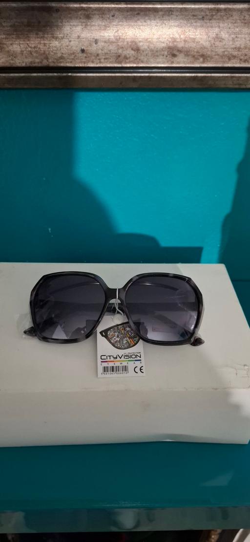  — Sunglasses
