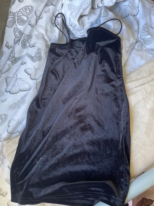  — Dress