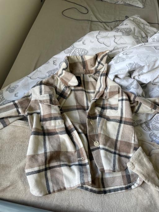  — Jacket