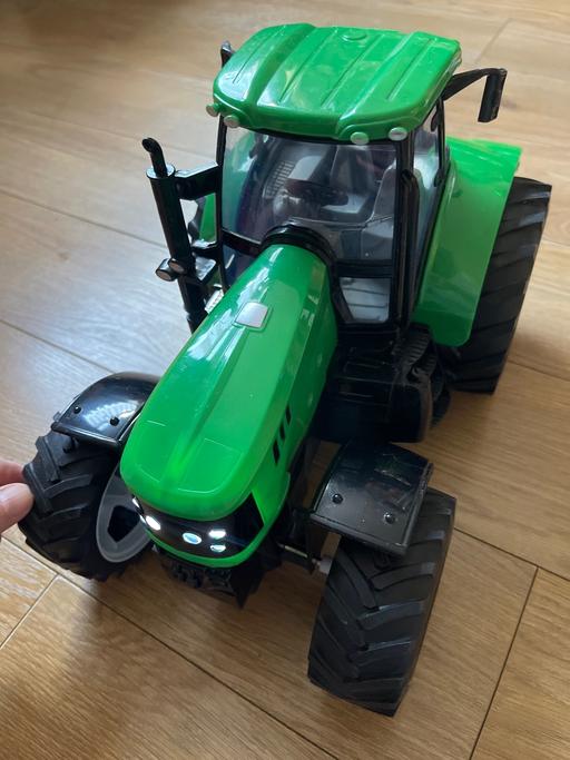  — Tractor toy with sound and lights
