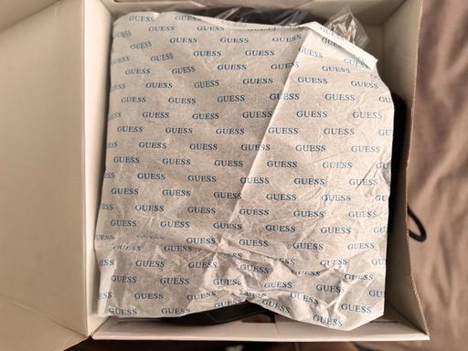 — GUESS boots