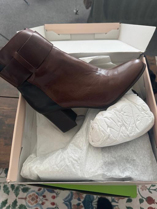  — Boots
