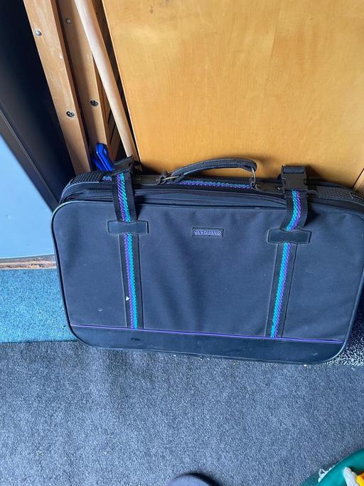  — vanguard suitcase