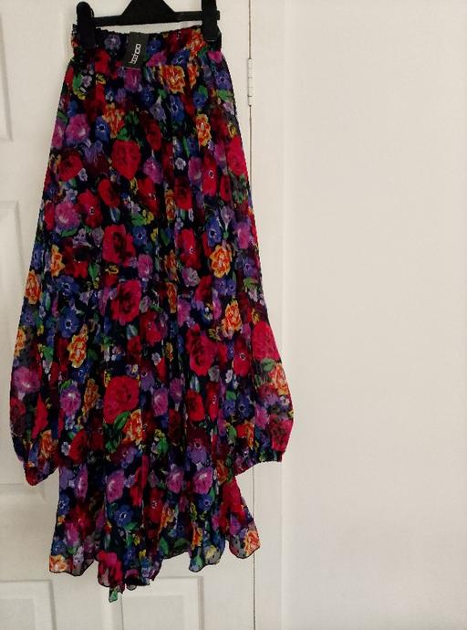  — Dress