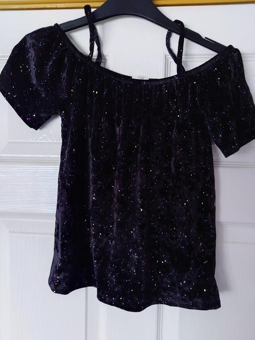  — Girls sparkly black top size 9 years