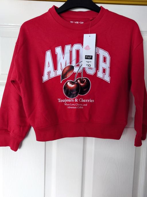  — Girls red jumper size 7-8 years