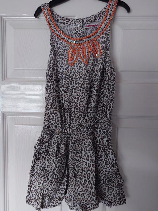  — Girls leopard print playsuit size 9-10 years