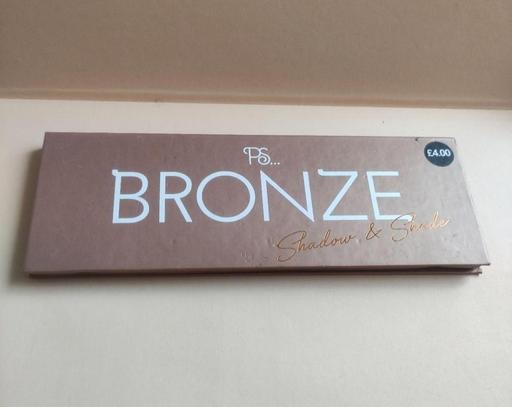  — Bronze eye shadow