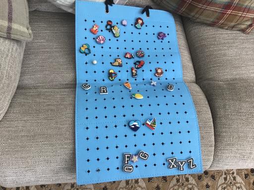  — Thirty croc charms